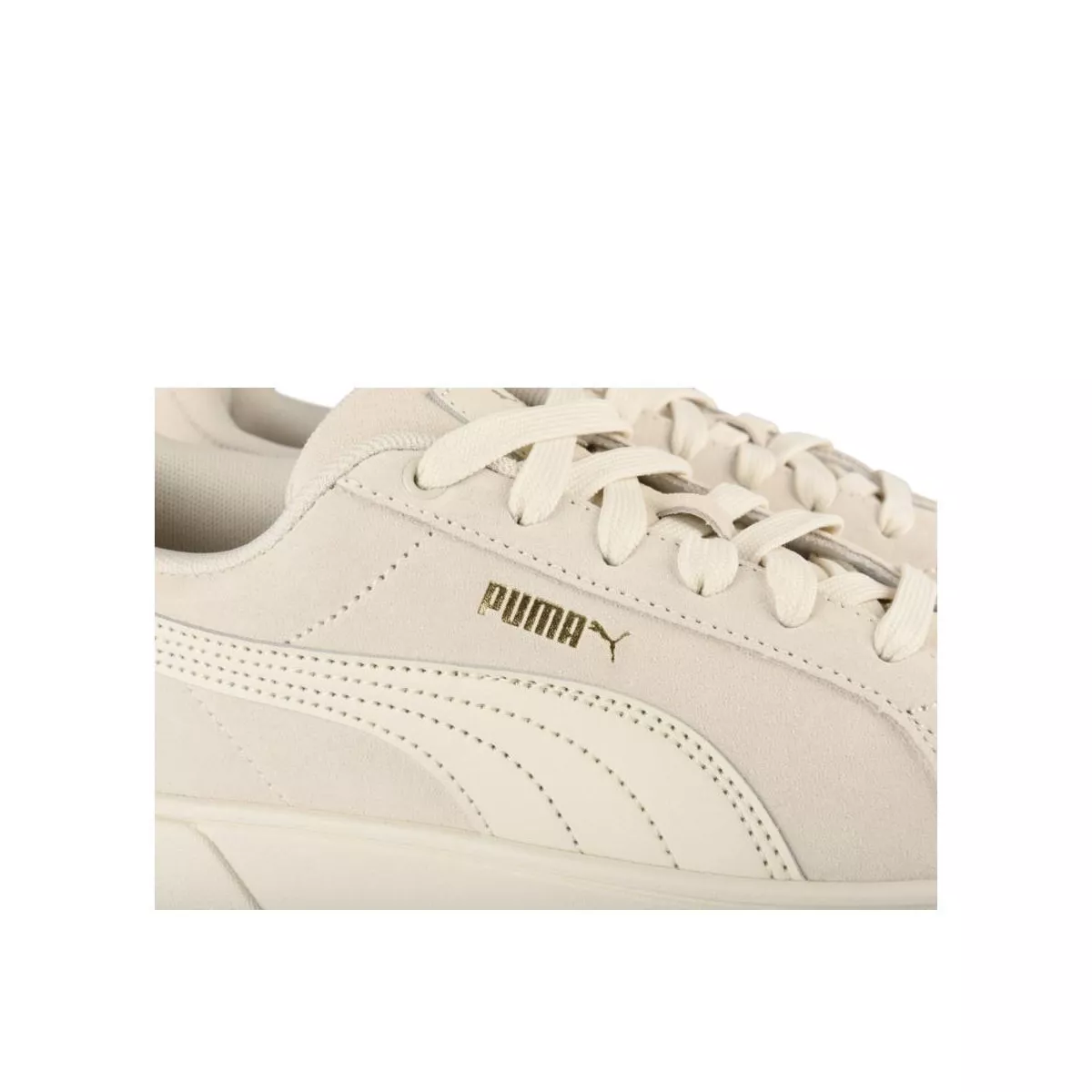 Puma blanche et 2025 or